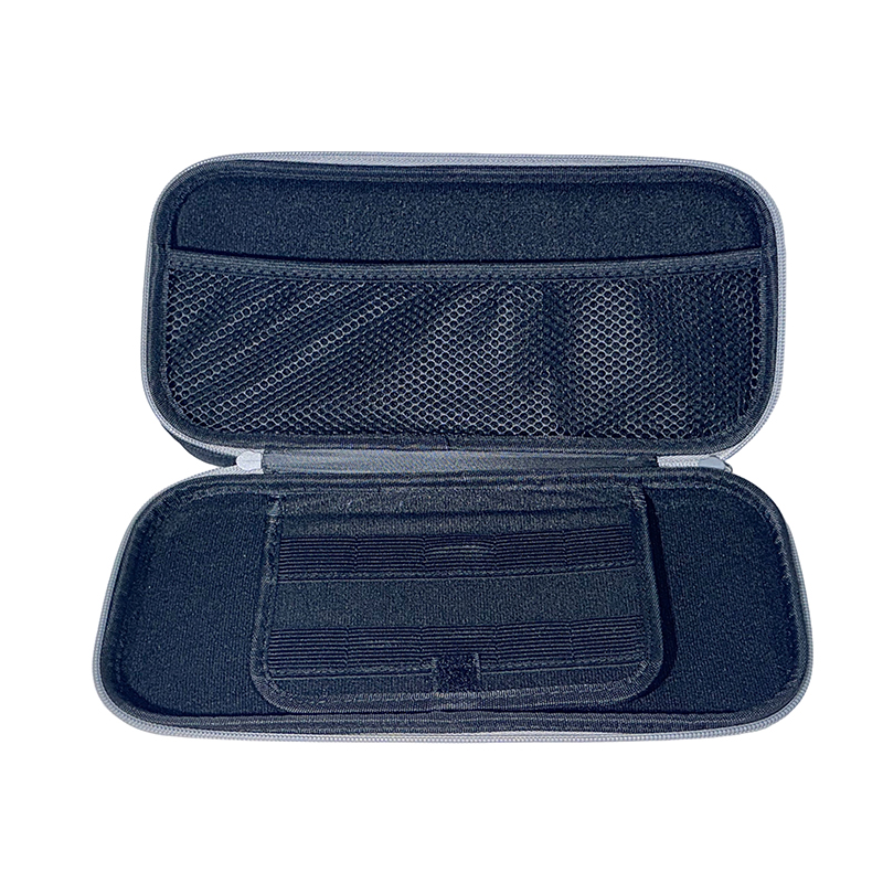Interior view of custom Nintendo Switch 2 EVA case, showing black mesh pocket for accessories and game cartridge slots. Manufactured for B2B wholesale.