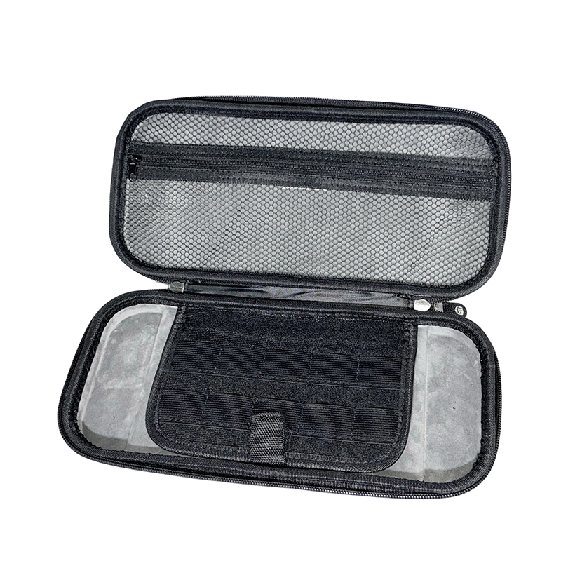 Inside view of premium Switch 2 hard shell case showing a zippered mesh pocket, game card slots, and soft anti-scratch lining for console protection. Manufactured by direct OEM supplier.